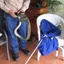 Snake removal technician safely handling a snake indoors in {city}, {state}
